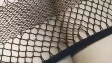 Hot Desi babe in fishnet dress has her pussy XXX rubbed by lover