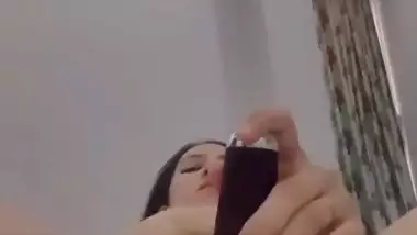 Nude Bhabhi presses boobs and fingers her pussy