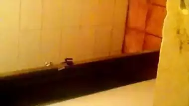 Girl spying on her stepmom having nude bath