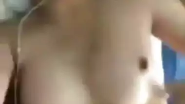 Indian nude girl shows her big, tight boobs in MMS